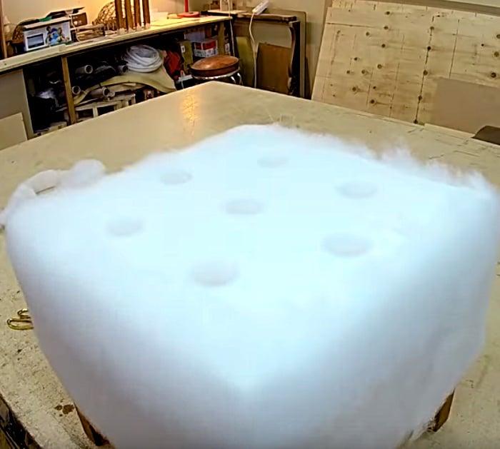 Make a DIY Ottoman Pouf for under Ten Dollars with plywood and foam