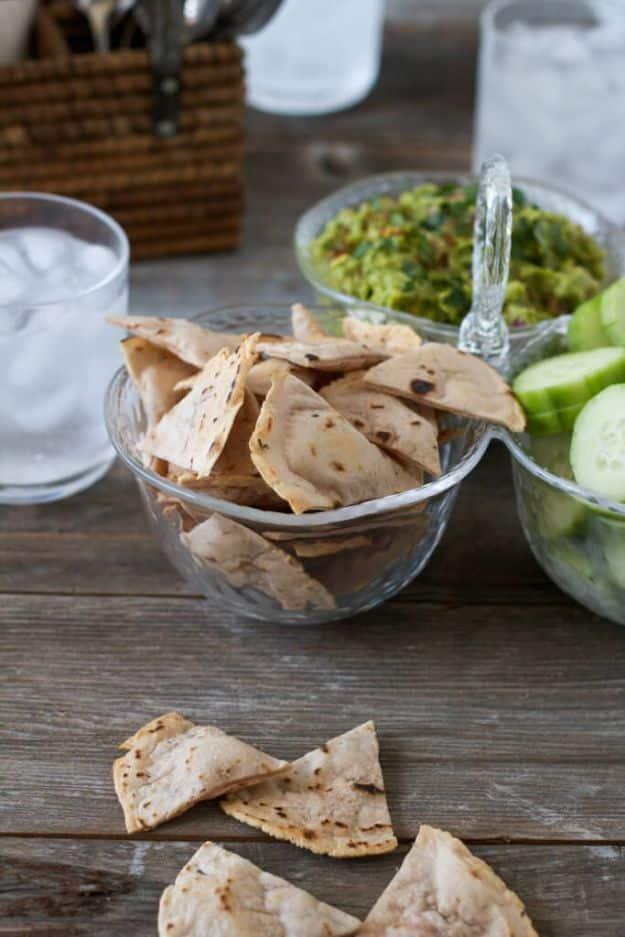 Herbed cassava flour tortilla chips baked crisp on a sheet pan, a grain free gluten free snack recipe