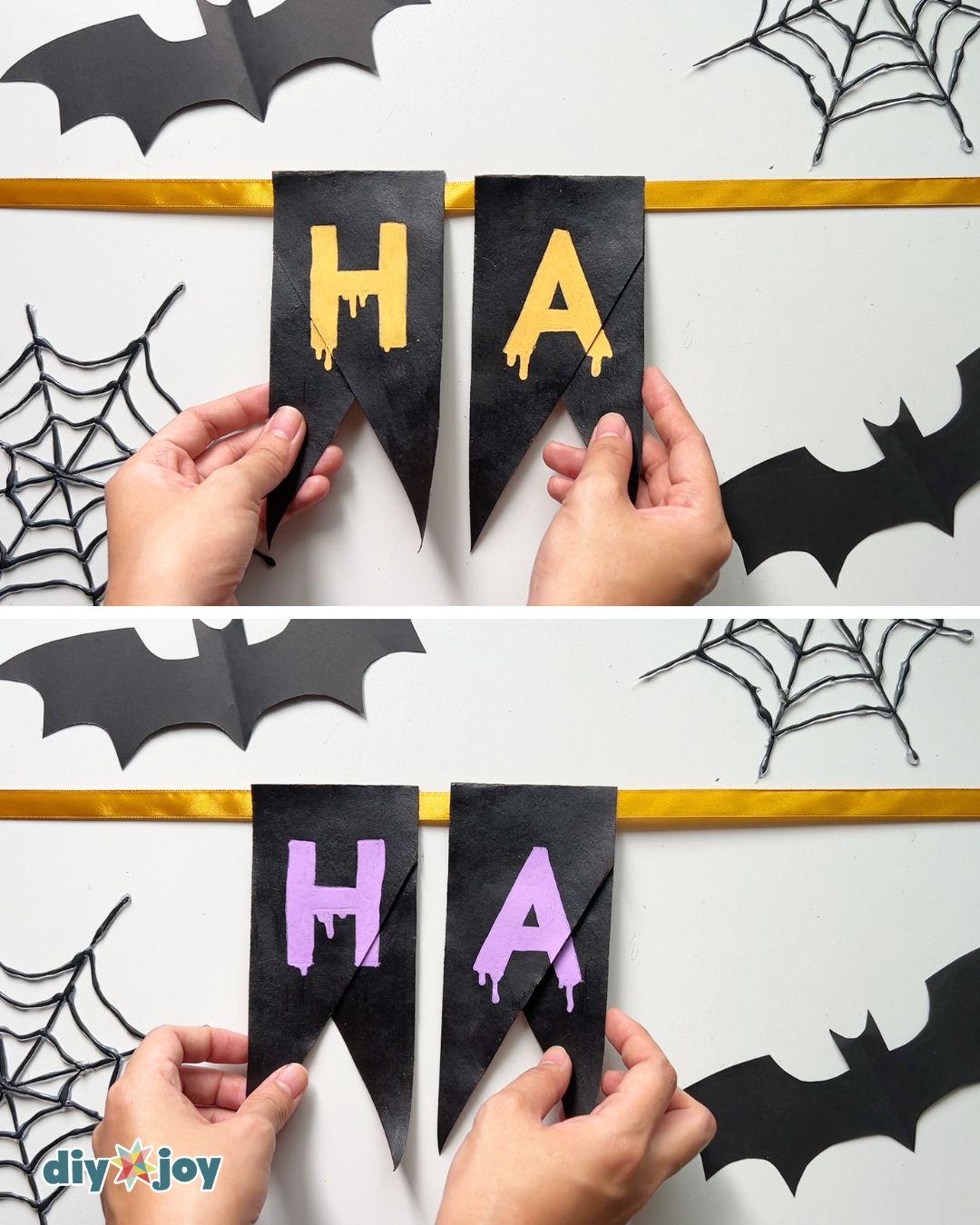 Step 4 of the Halloween banner tutorial - hanging the painted bunting pieces on a ribbon, no sewing needed.