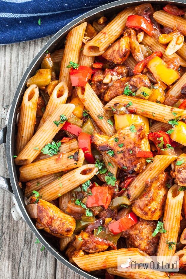 One pan chicken fajita pasta with penne, bell peppers, onions and fire roasted tomatoes in a skillet