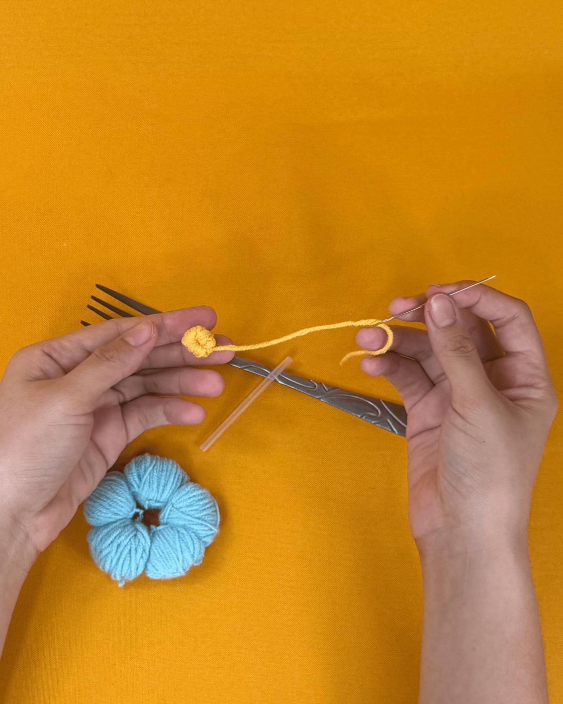Homemade Flowers Using Yarn — how to make diy yarn flowers