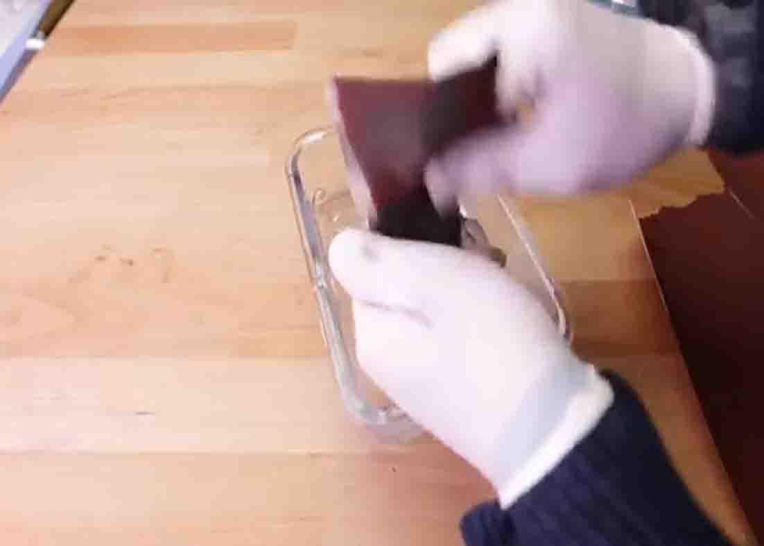 Scrubbing the rust away using sandpaper