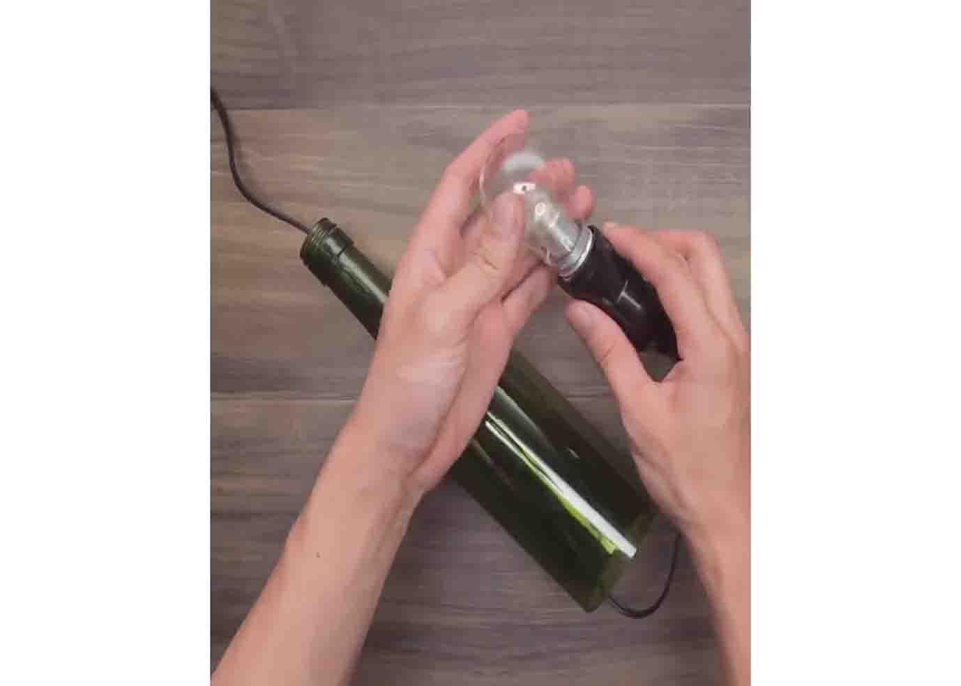 Attaching the lightbulb into the socket