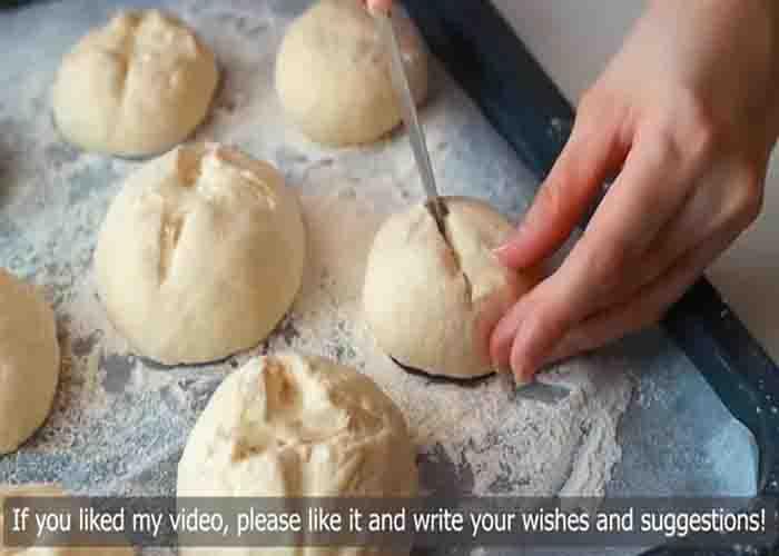 Cutting a slit on each dough buns