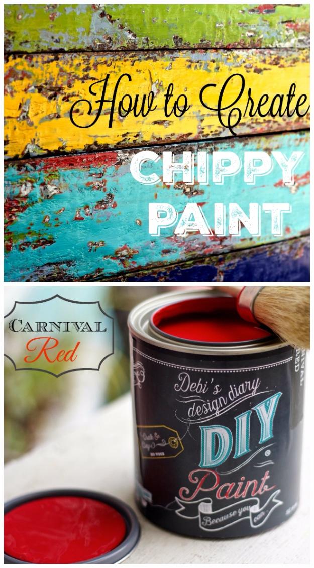 DIY paint technique for a weathered boat finish, chippy layers of yellow green red and turquoise over old wood boards