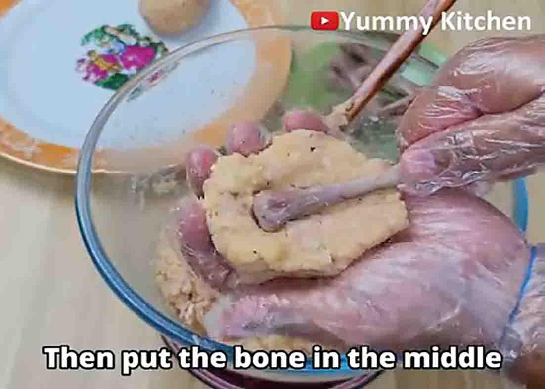 Assembling the chicken potato drumstick