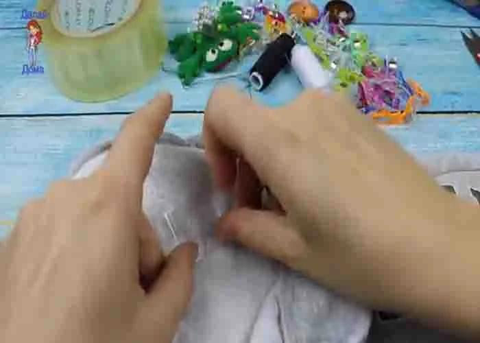 Adding a piece of tape on the back of the torn fabric