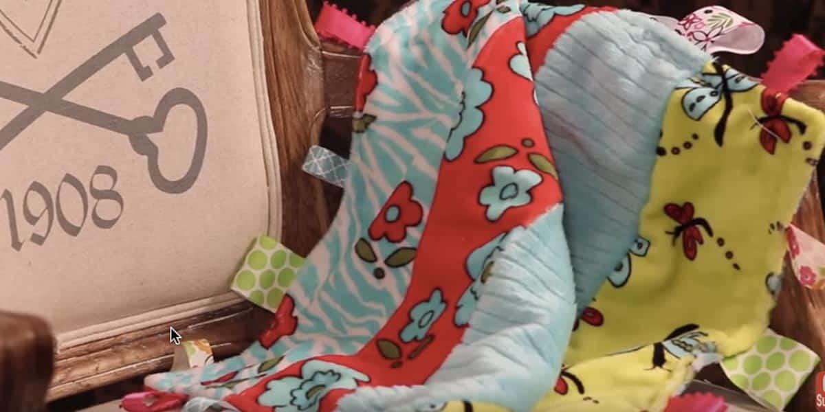 She Makes An Adorable Busy Tag Baby Blanket For A Special Baby Gift