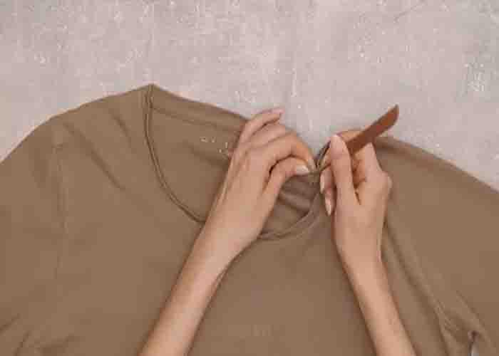 Ripping the seam to fix a stretched t-shirt neckline