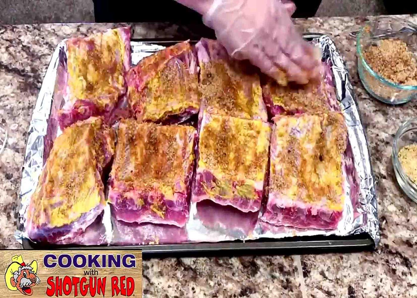 Rubbing some herbs into the baby back ribs