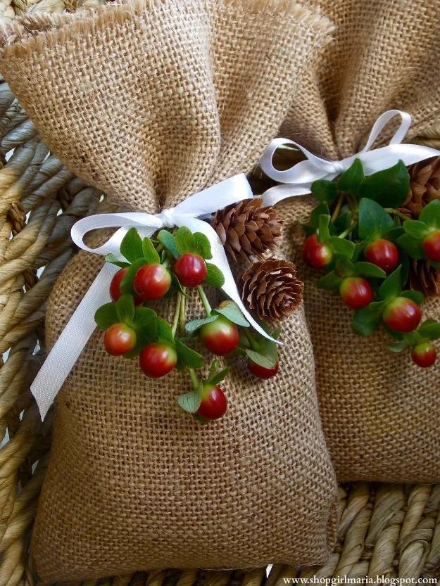Burlap treat bags filled and tied for a rustic textured gift bag that skips wrapping paper entirely for the whole family