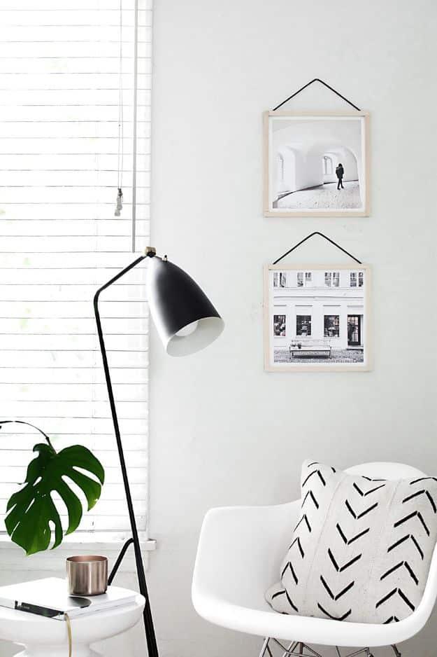 DIY Hanging Frames, a popular budget living room decor idea pick from this roundup and a popular choice on this list