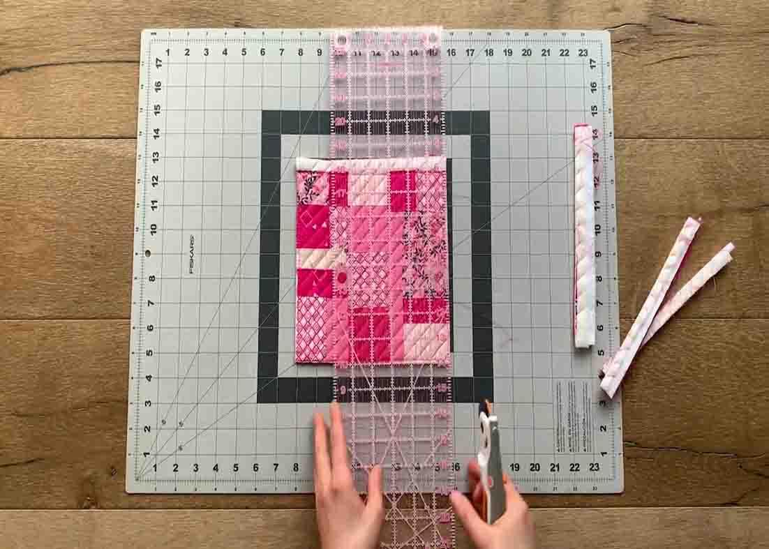 Trimming the edges of the quilting project
