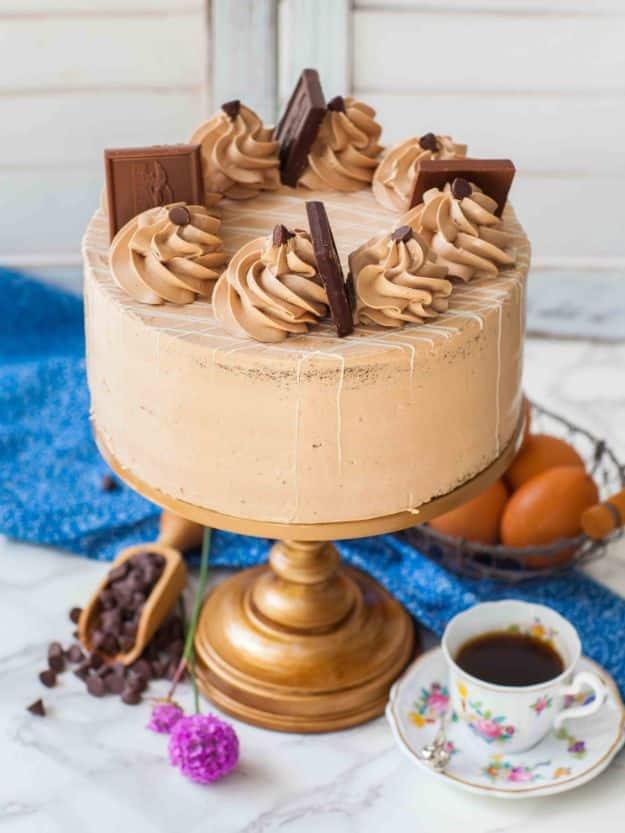 Chocolate coffee cake finished with silky French buttercream that holds its piped shape at a party recipe for a celebration