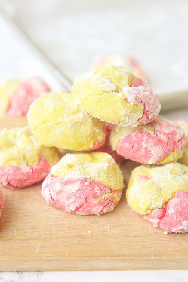 Strawberry lemonade crinkle cookies rolled in powdered sugar with pink and yellow tops, a soft gluten free cookie