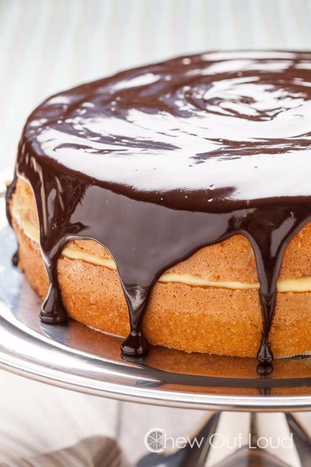 Boston cream pie with a soft sponge cake, thick vanilla custard filling and dark chocolate ganache on top