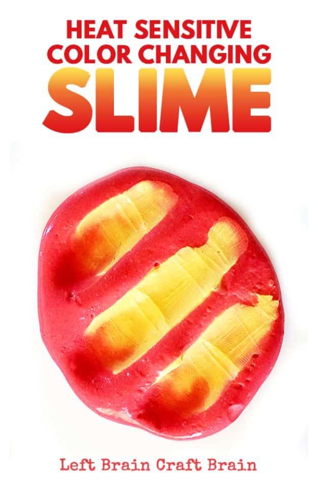 Heat sensitive color changing slime, a red disc of slime with four yellow finger marks pressed into it on a white background