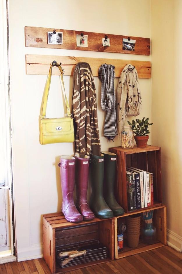 Entryway Pallets and Crates Organizer, one of the best entryway decor ideas on this list and one worth pinning for later