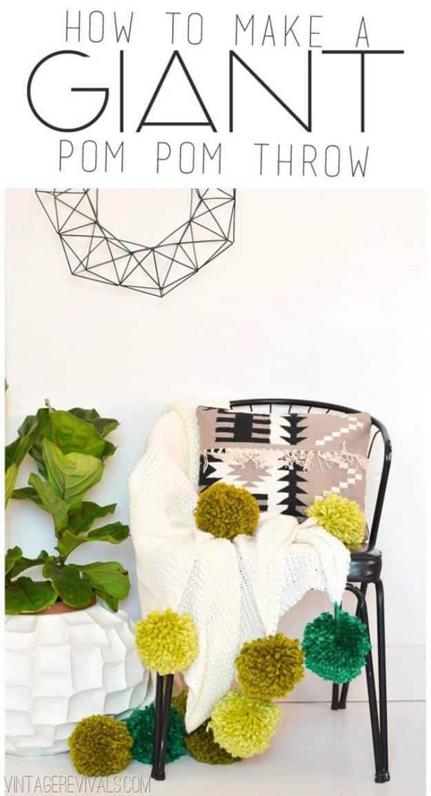 Giant Ombre Pom Pom Blanket, a piece that looks far pricier than it is and a warm touch worth adding to any room
