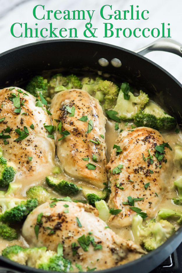 Skillet creamy garlic chicken with broccoli, browned breasts and florets in a pale creamy sauce in one pan