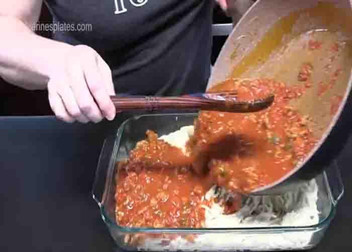 Assembling the spaghetti alfredo bake