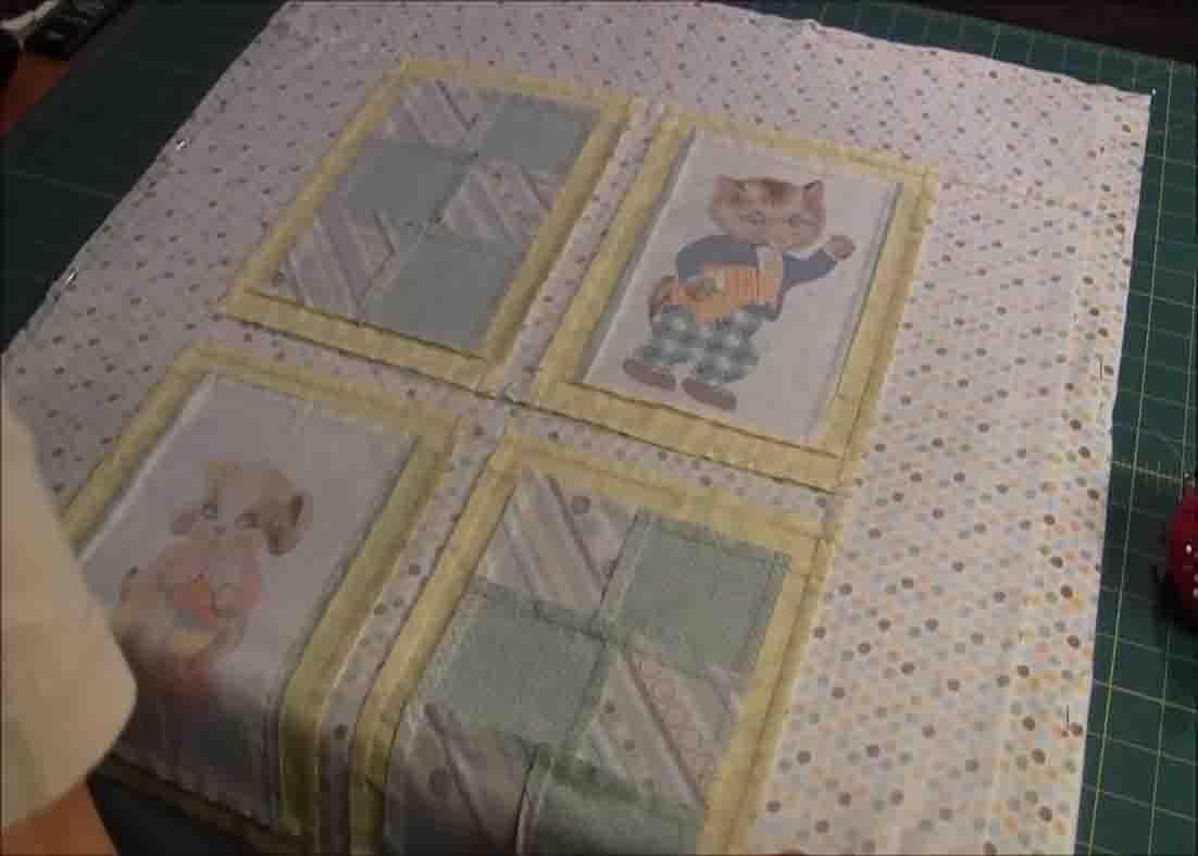 Pinning the top quilt to the backing and batting to do the pillowcase method