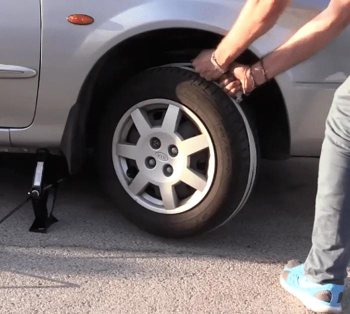 Wrapping a Rope Around the Wheel of the Car