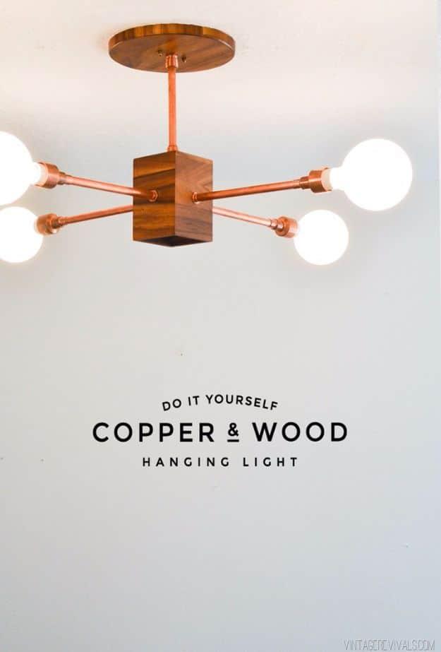 DIY Copper and Wood Hanging Light Fixture, a creative indoor lighting idea for any room and the results are worth it