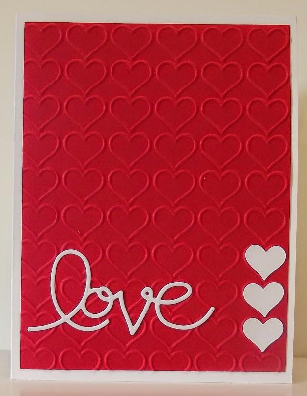 Happy Heart Valentine's card with an embossed heart pattern panel and one small punched heart on top
