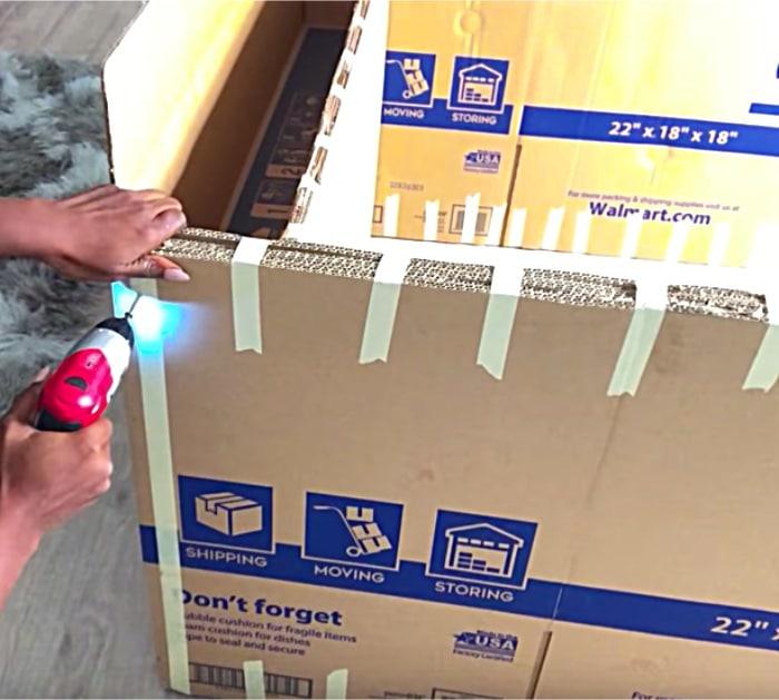 Make a DIY Daybed with storage out of a Samsung TV Box