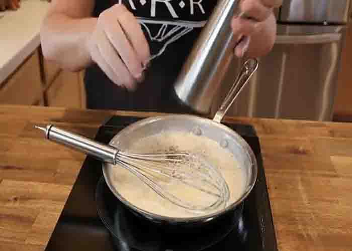 Making the four cheese sauce for the stuffed mushrooms