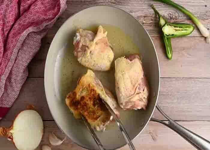 Browning the chicken thighs for the Jamaican jerk recipe