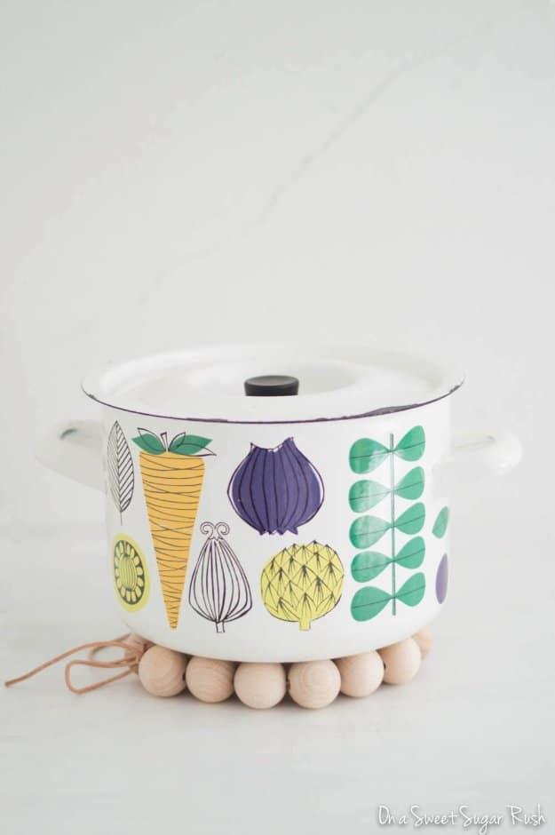 DIY Wooden Bead Trivet, a popular choice on this list and a simple DIY that brightens up a plain kitchen