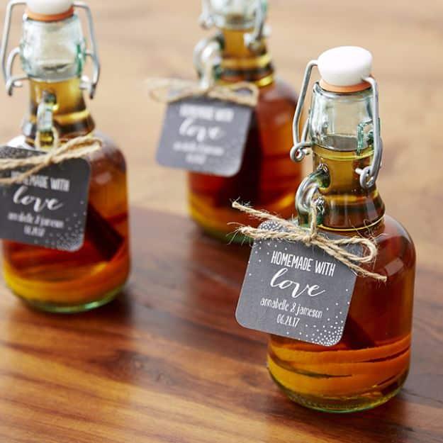 DIY Whiskey Bottle Favors, a simple project that fits any wedding theme and an elegant handmade touch for the reception table