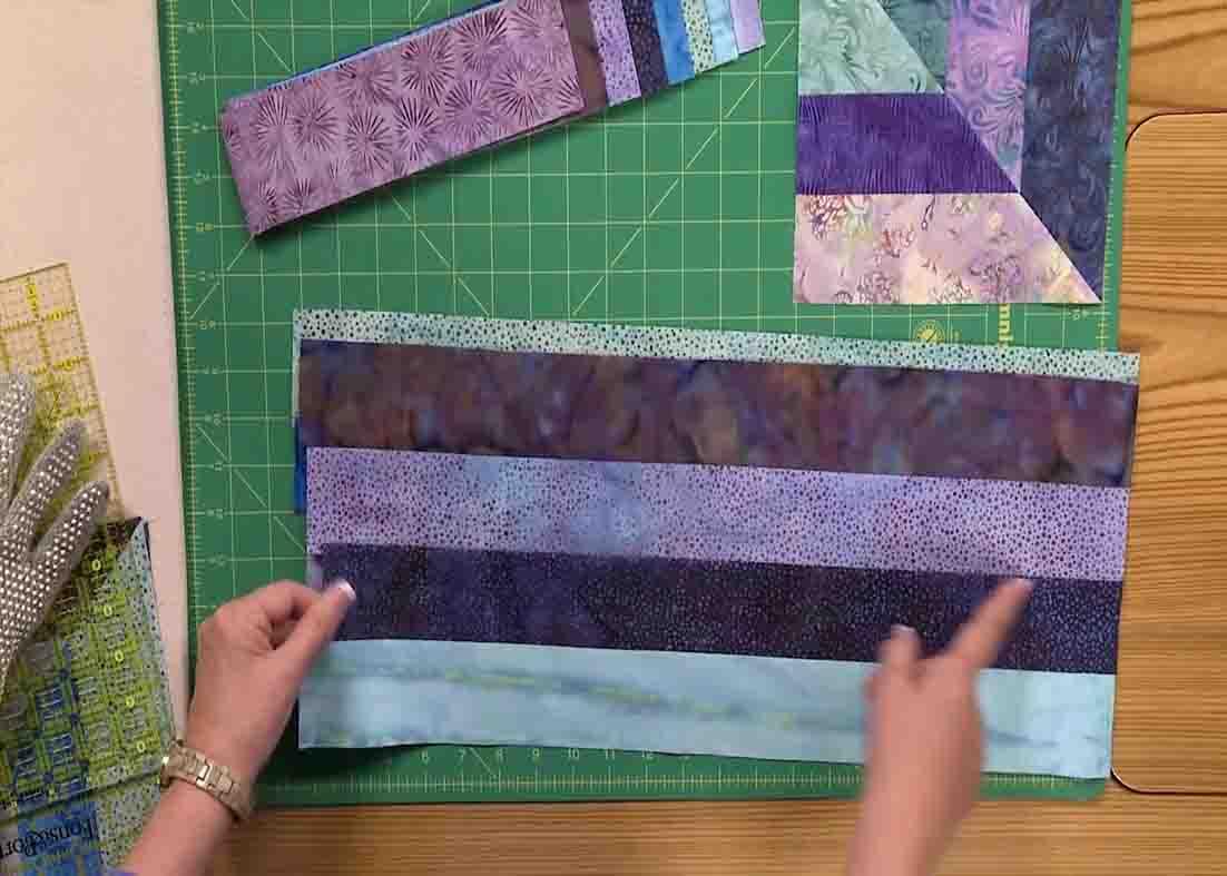 Lining the strip sets together to make the cool water quilt block