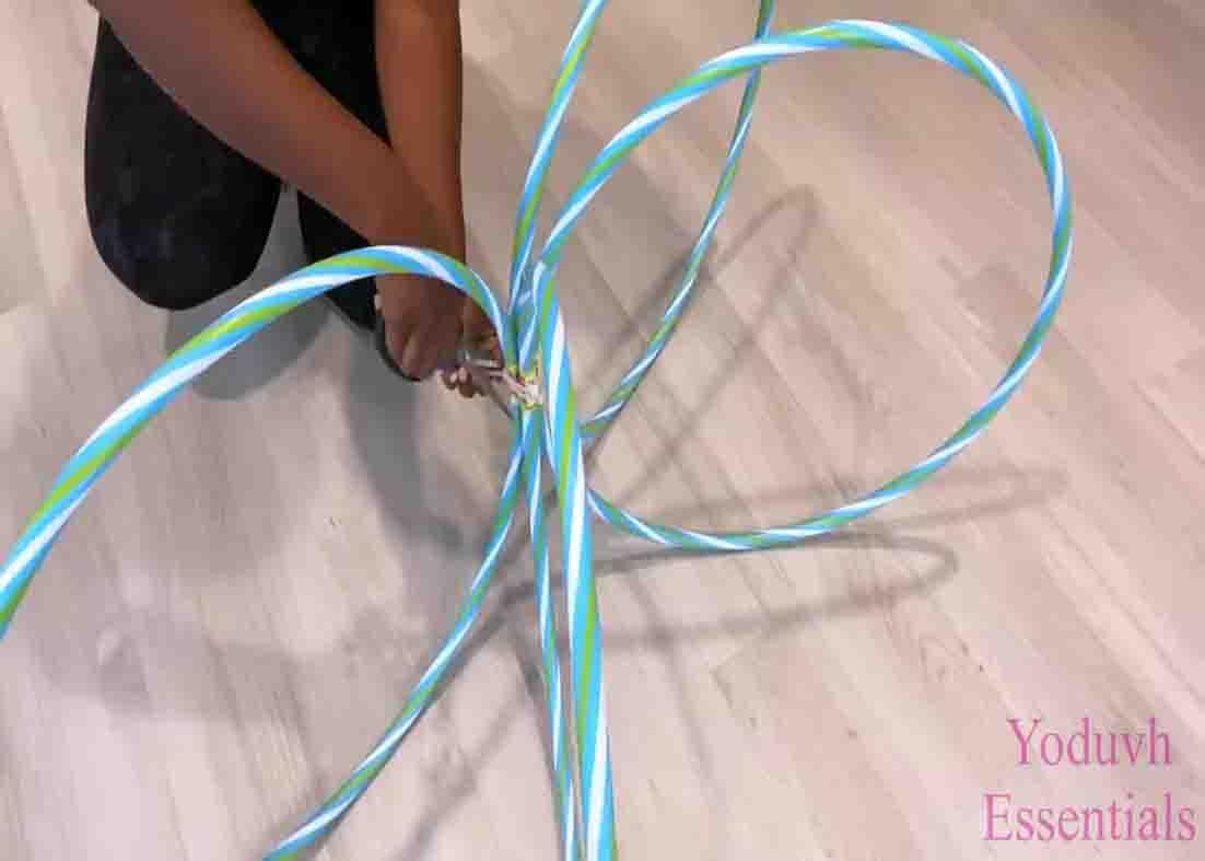 Attaching the zip ties together to make the DIY coffee table