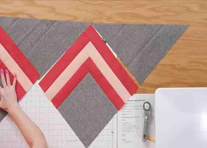 Laying the woven chevron quilt top