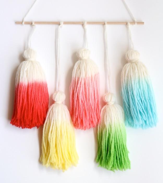Kool Aid Dip Dye Tassel Wall Hanging, a popular choice on this list and a colorful way to use up leftover yarn