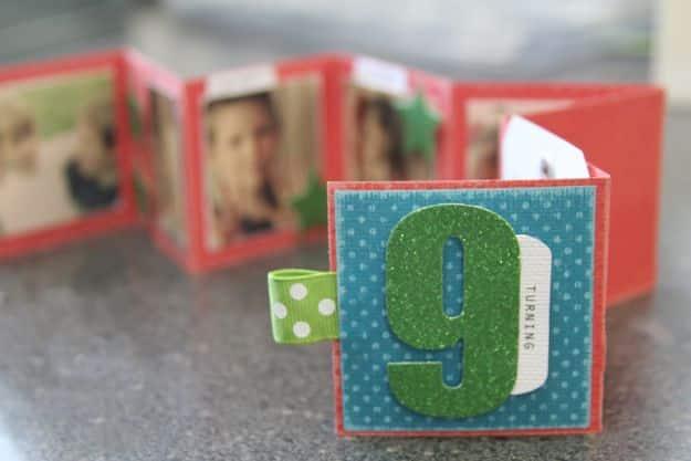 Mini photo album tucked into a small box for a birthday gift that doubles as a lasting keepsake card