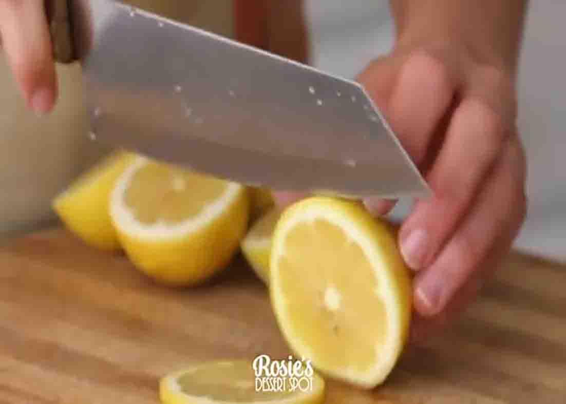 Slicing the lemons for the candied lemon slices recipe