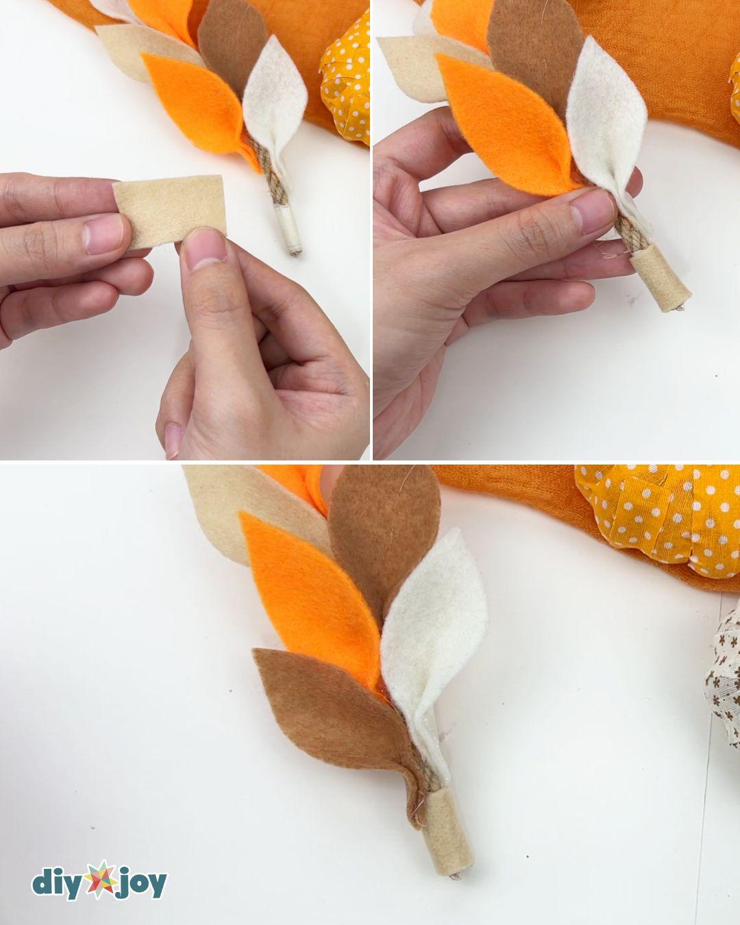 Fall home decor: a DIY fall leaf garland made from felt, rope, and pom-poms for the fireplace mantel.