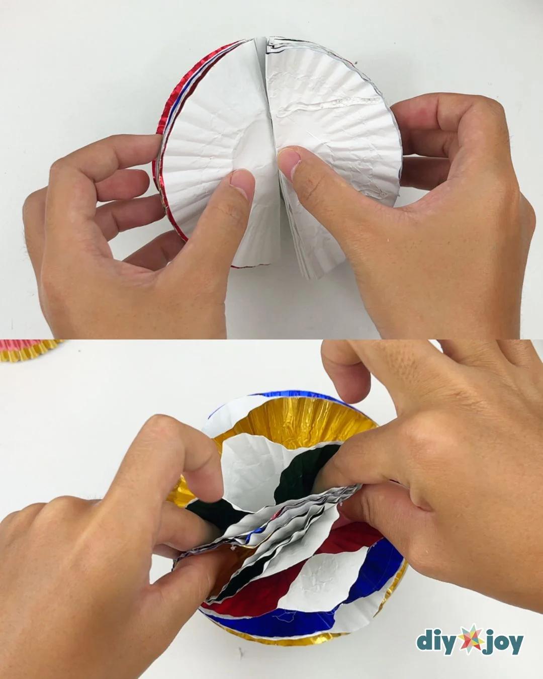 Christmas Crafts - two panel photo showing hands opening a folded white liner and pressing green, red, and white liner pieces onto a gold and blue base