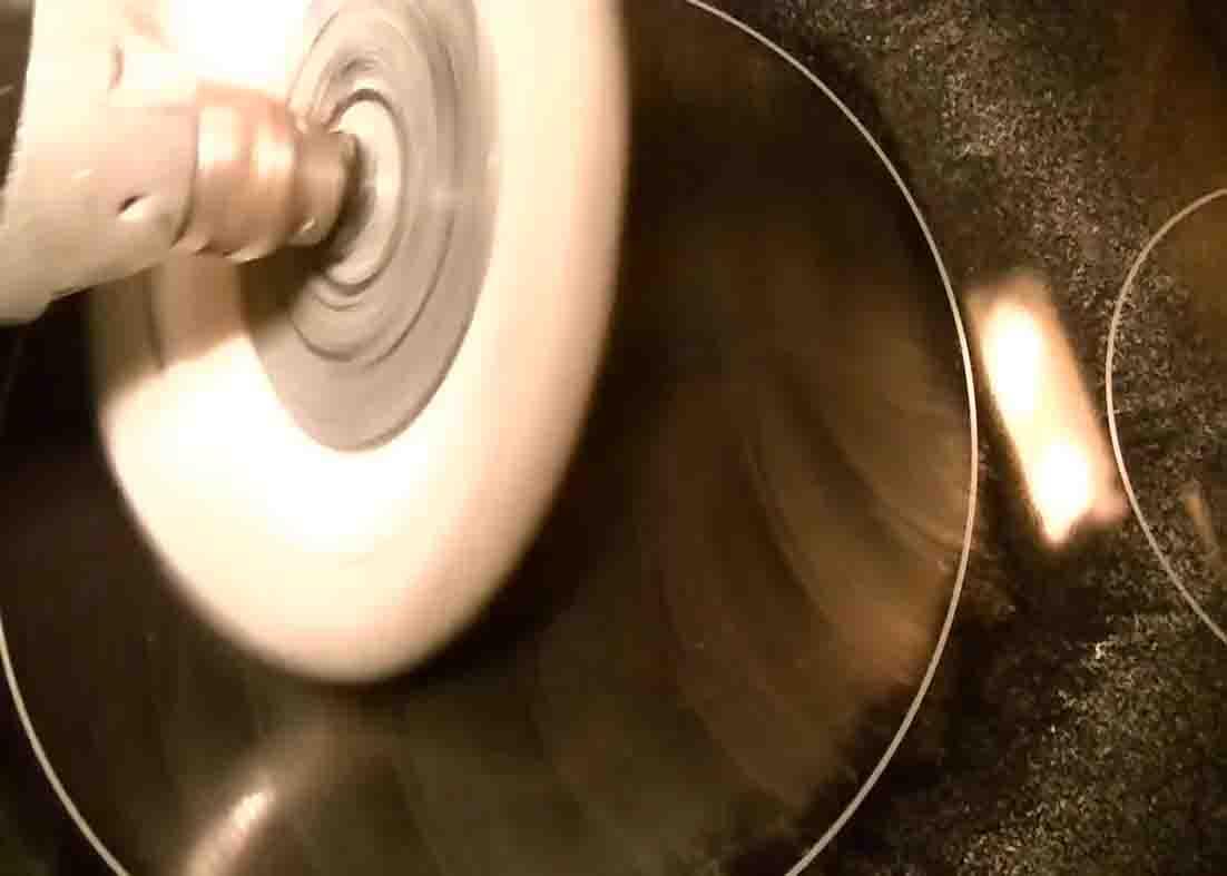 Polishing and removing the scratches out of the glass stove top