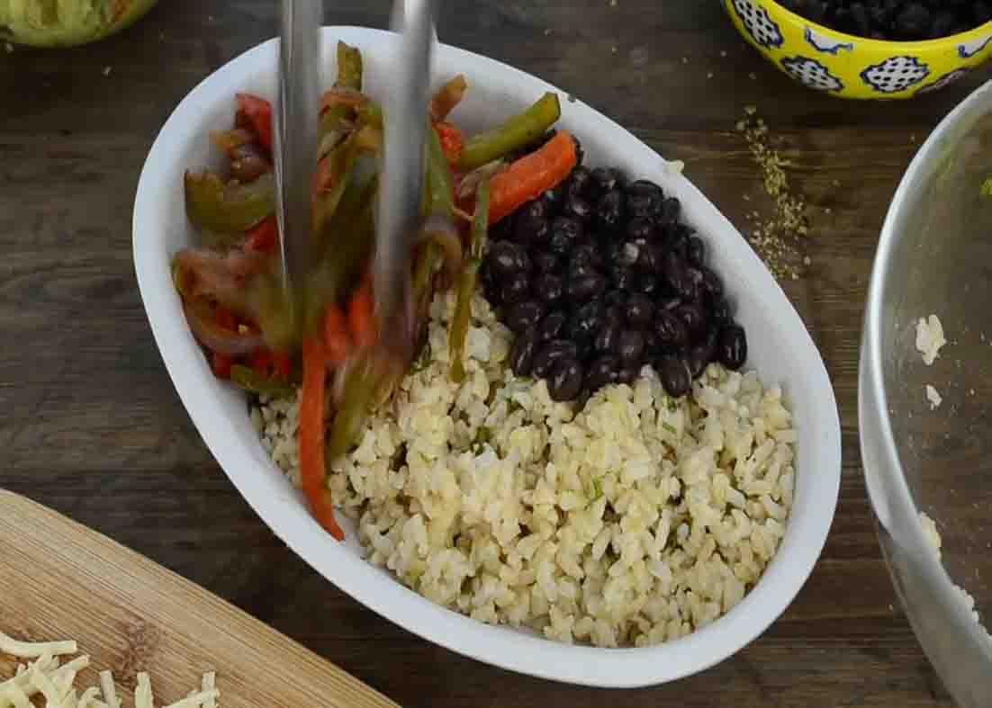 Assembling the burrito bowl