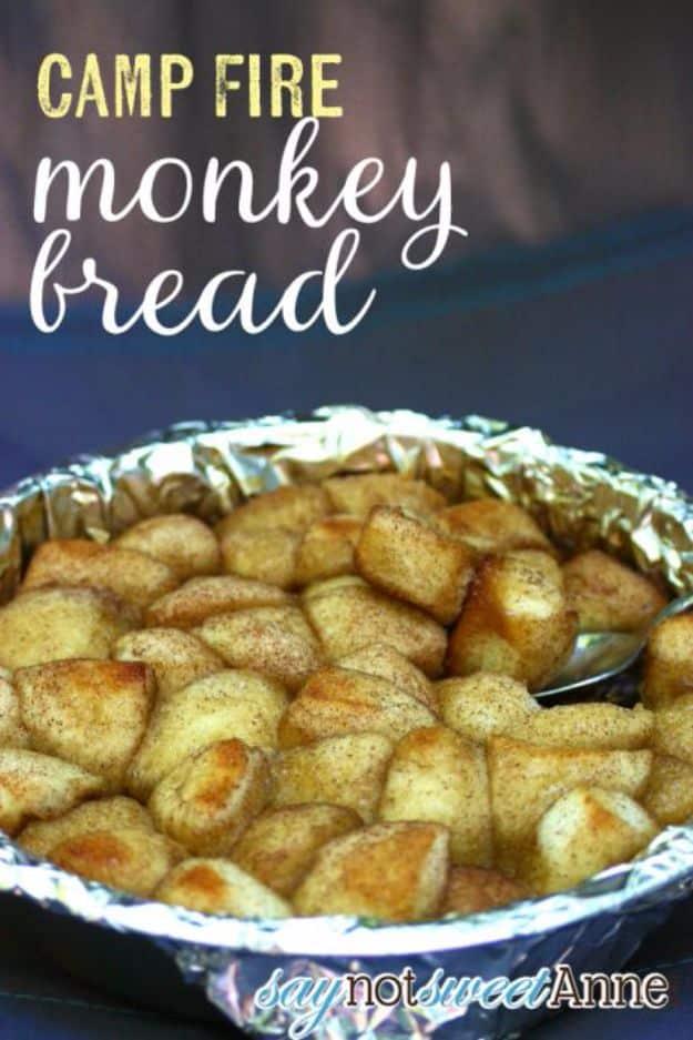 Foil pan of golden cinnamon sugar coated biscuit pieces baked over a campfire, under a typeset title block