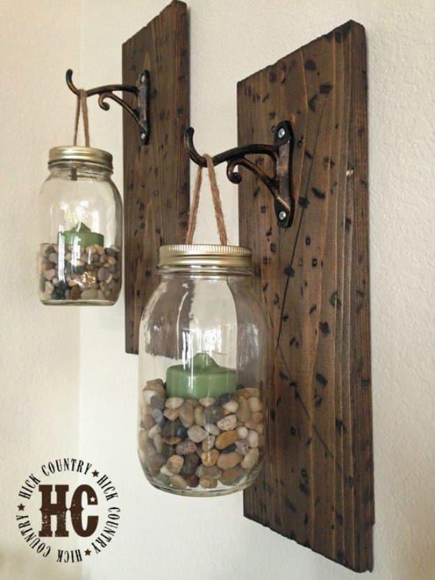 Rustic DIY Mason Jar Wall Lanterns, a nice change of pace from something bought off the shelf and worth a look