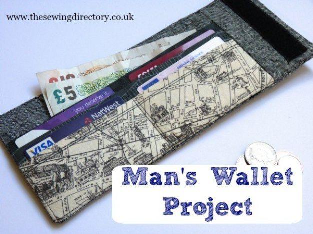 Mans wallet project, an open gray denim wallet with vintage map print card pockets holding notes and cards