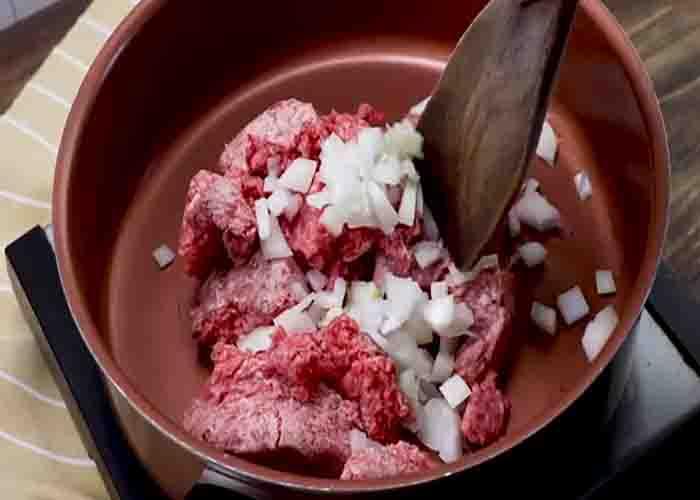 Cooking the ground beef for the chili mac