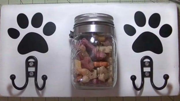 A dog station built to hold a leash and mason jar treats together, a convenient handmade gift for pet owners