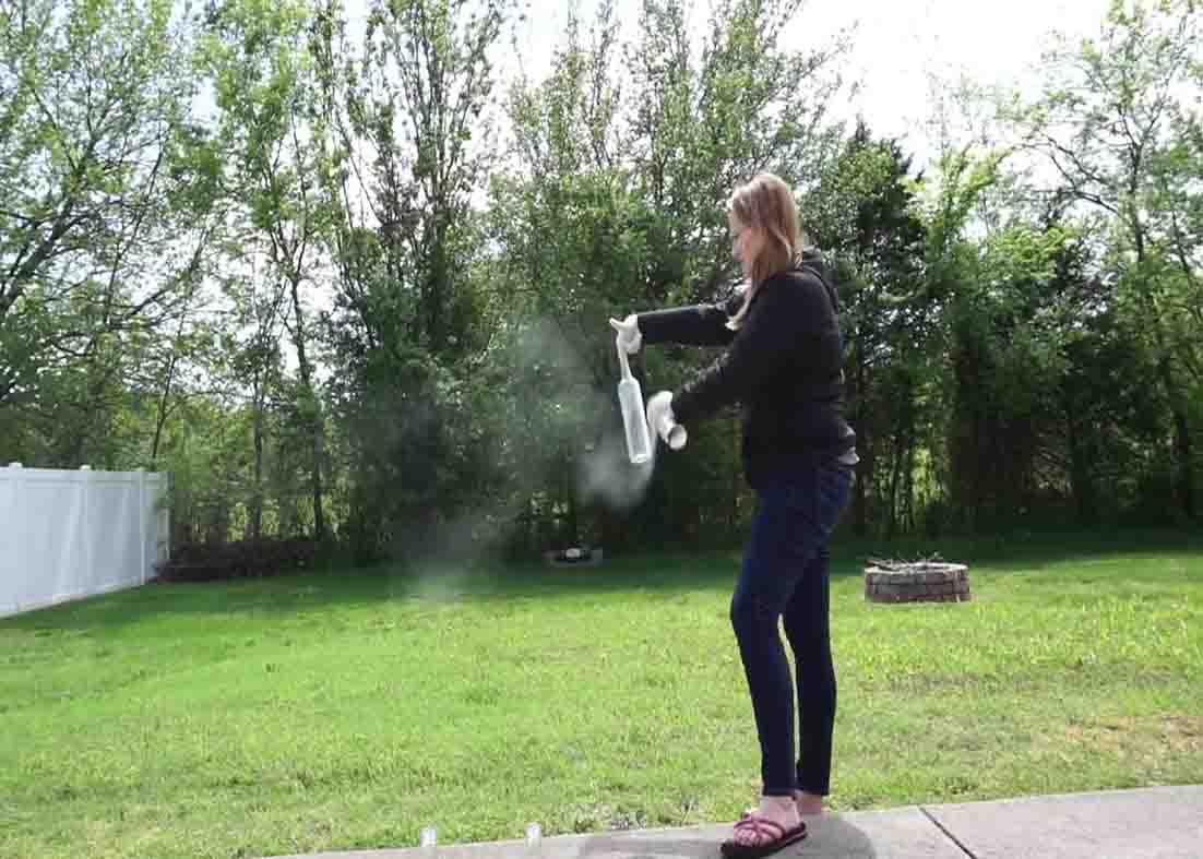 Spray painting the wine bottles